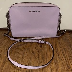 MK lilac cross body camera bag.